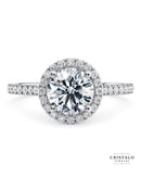A stunning Aphrodite oval-cut diamond halo ring, radiating elegance in 18k white gold.