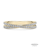 The Cassia Eternity ring with a Castle setting for added brilliance. This 18k yellow gold ring features two overlapping diamond bands with a total weight of approx. 0.25ct.