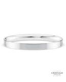 A modern wedding band in 18k white gold. Features a sharp, clean edge and a rounded interior for comfort.