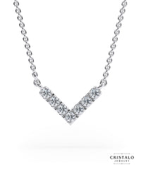 Geometric diamond pendant that can be worn alone or paired with Confetti collection.