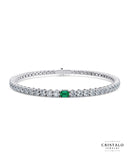 Elegant white gold Ivy bracelet with emerald centerpiece and sparkling diamonds.