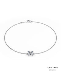 Delicate Rossetti bracelet in 18k white gold with round and pear-shaped diamonds.