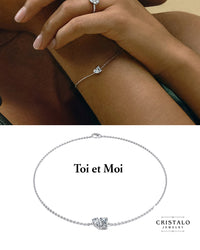 Toi et Moi in White Gold, set with a 0.32ct emerald diamond and a 0.20ct pear diamond.All diamonds from our Toi et Moi selection are laboratory-grown.